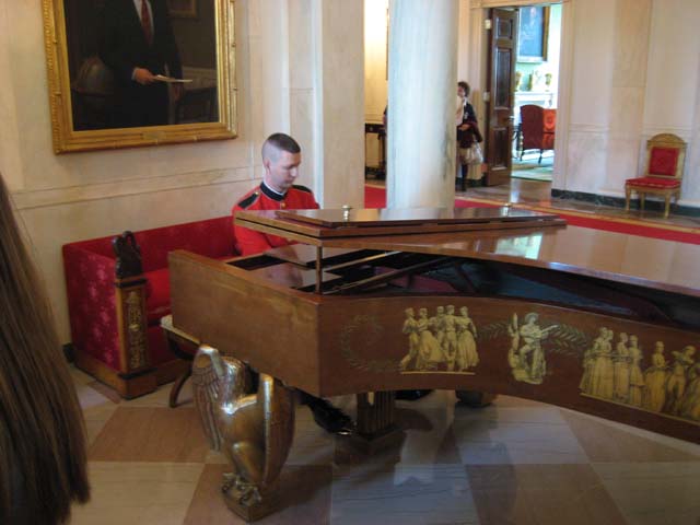 Marine playing piano